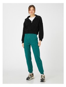 Koton Melange vzorčne jogger hlače z elastičnim pasom, žepi.