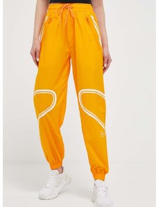 Hlače za vadbo adidas by Stella McCartney TruePace oranžna barva