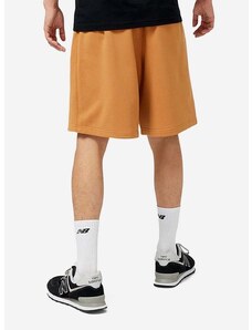 Bombažne kratke hlače New Balance oranžna barva