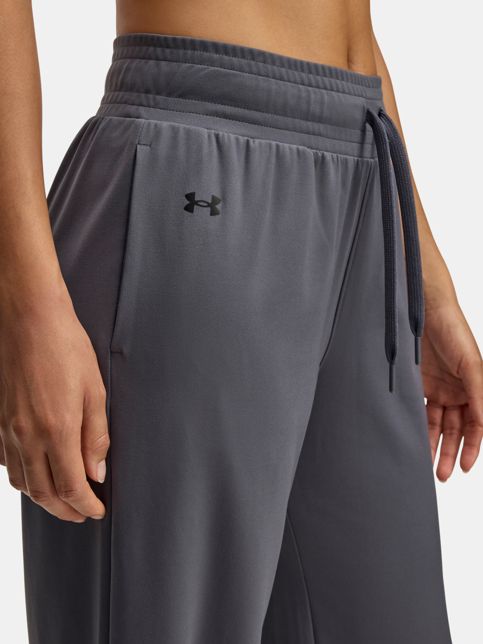 Ženska Under Armour Ženske športne hlače Under Armour Motion Open Hem Pant Siva