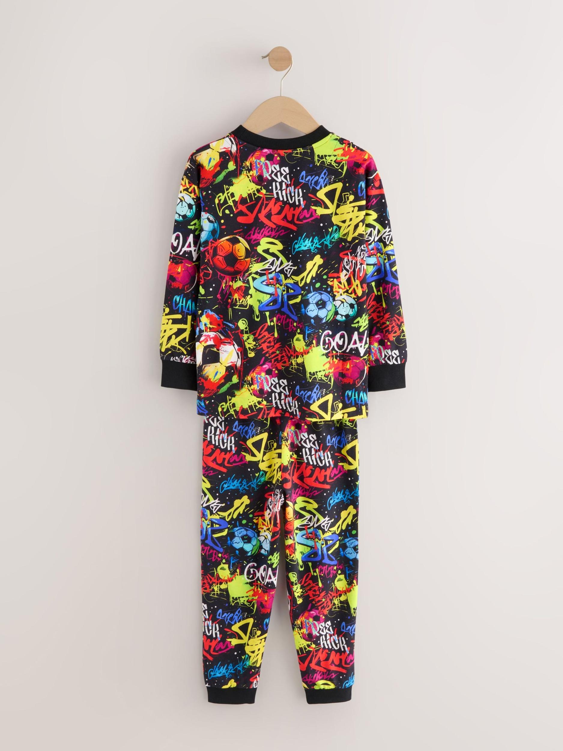 Next Pižama modra / neonsko zelena / rdeča / črna