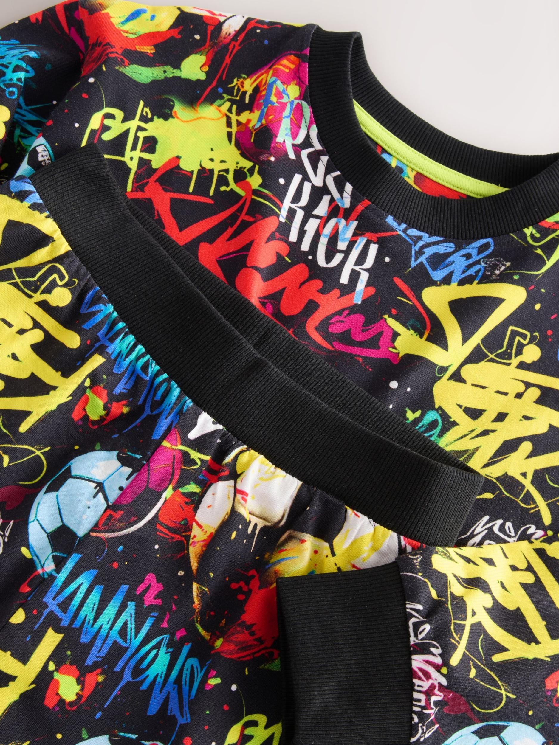 Next Pižama modra / neonsko zelena / rdeča / črna