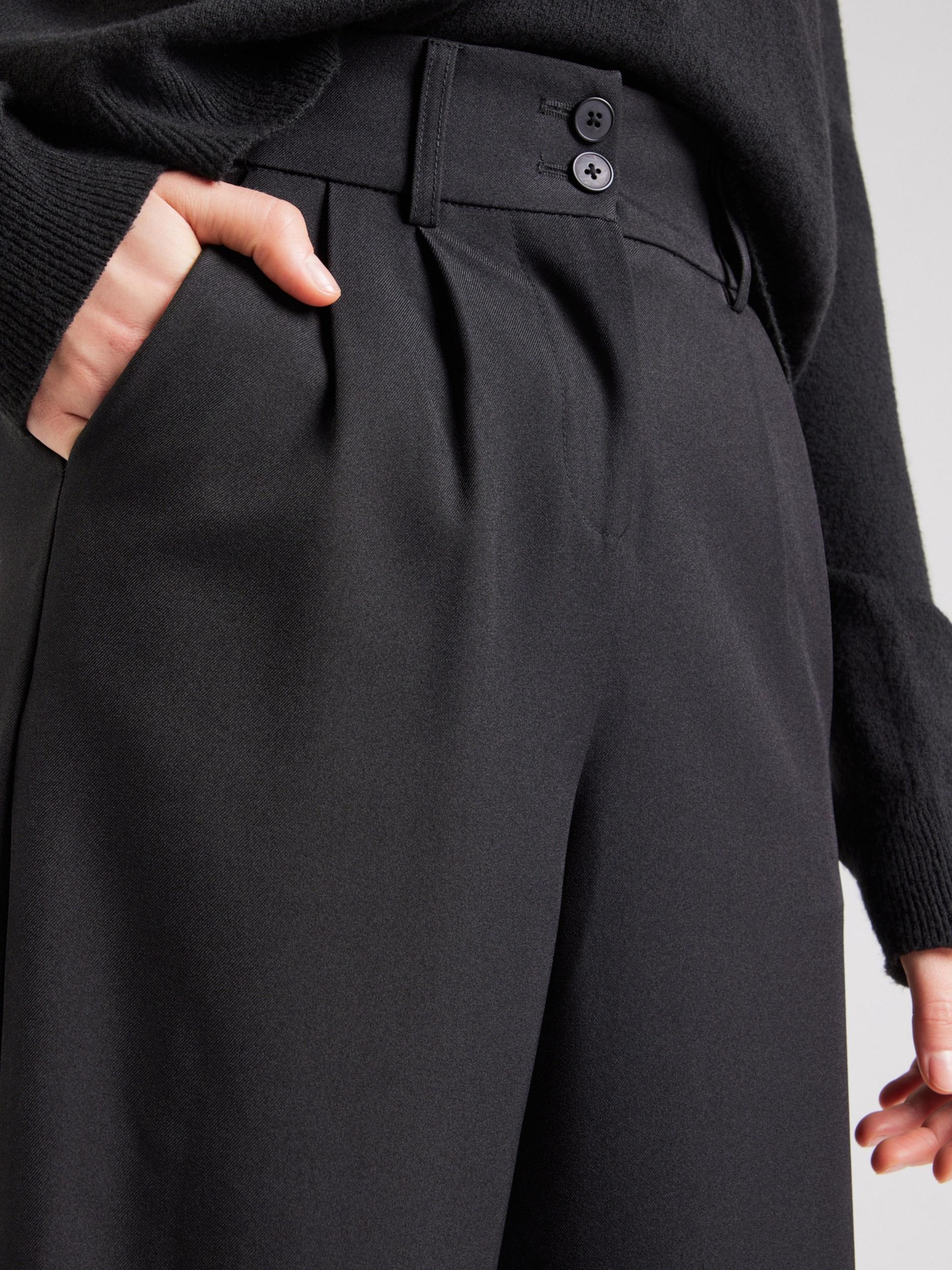 ABOUT YOU Hlače z naborki 'Edda' črna