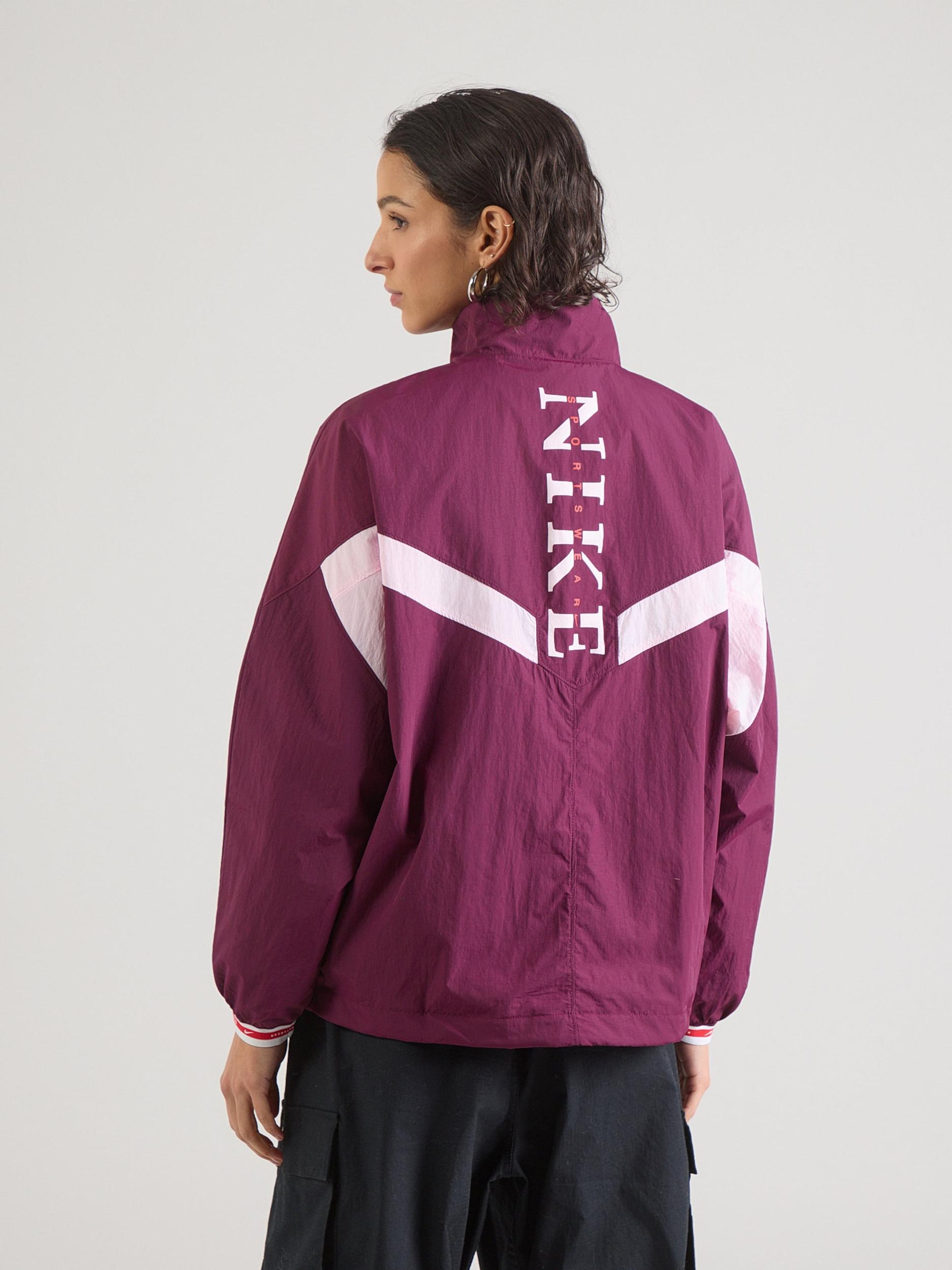 Nike Sportswear Prehodna jakna roza / rdeče vijolična