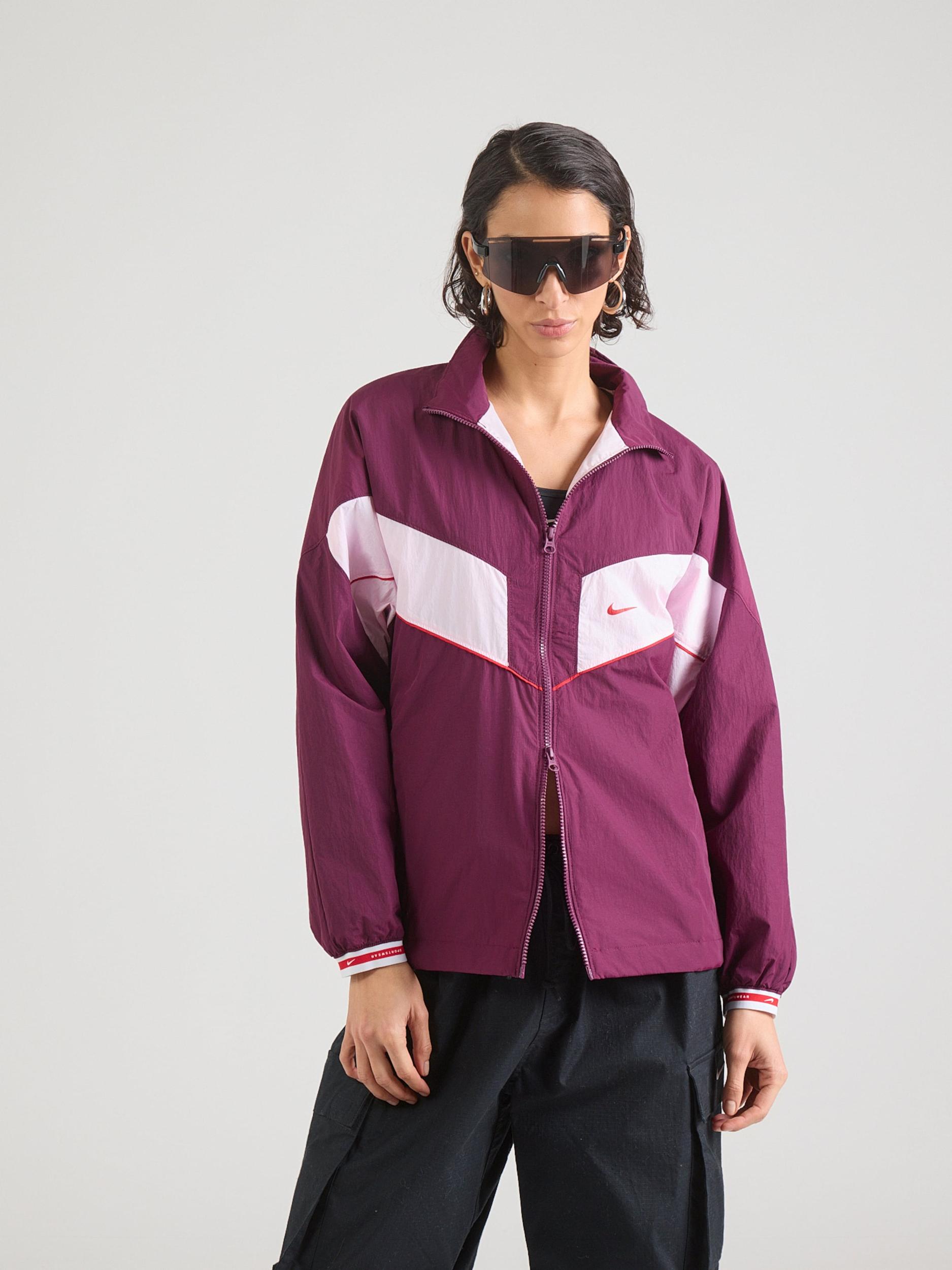 Nike Sportswear Prehodna jakna roza / rdeče vijolična