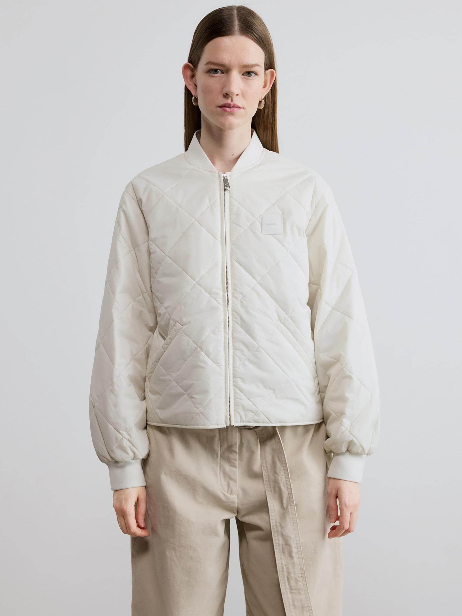 Calvin Klein Jeans Prehodna jakna naravno bela