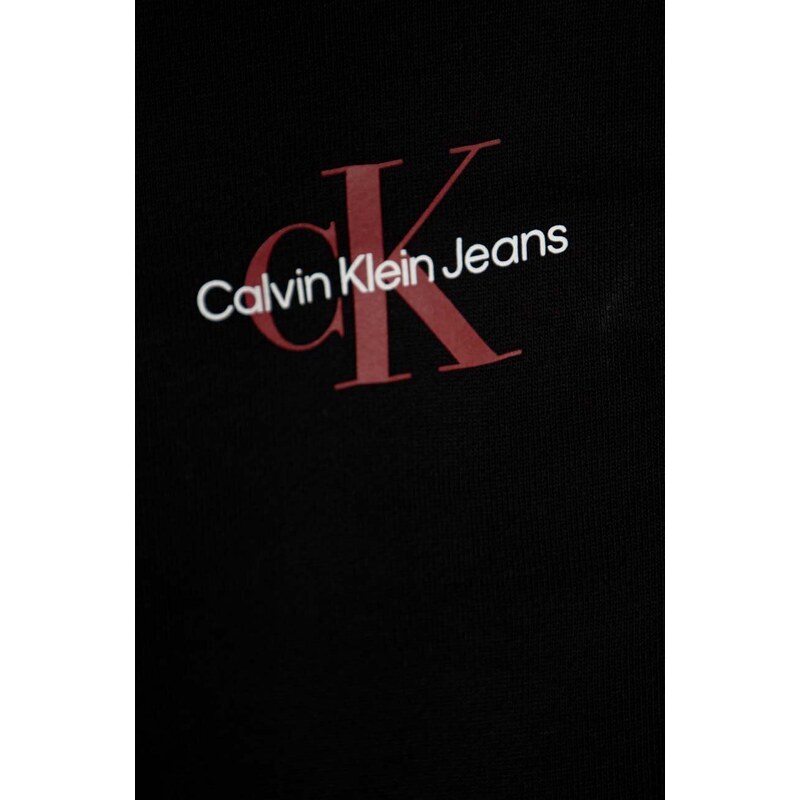 Otroška bombažna trenirka Calvin Klein Jeans črna barva