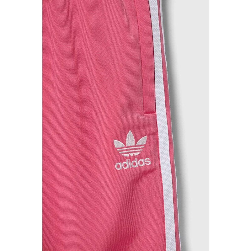 Otroški spodnji del trenirke adidas Originals roza barva