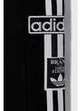 Otroški spodnji del trenirke adidas Originals črna barva